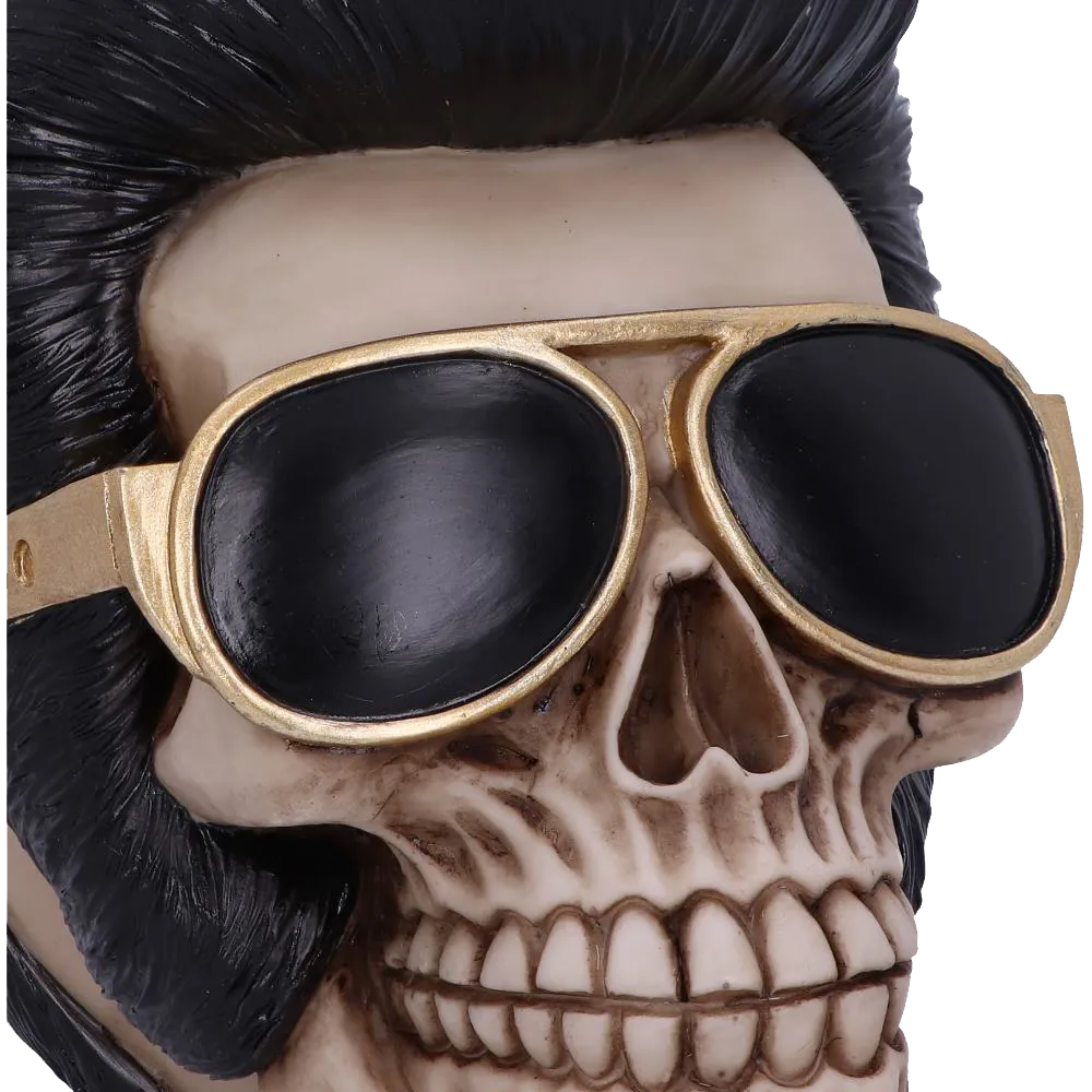 Détail des lunettes dorées sur le crâne