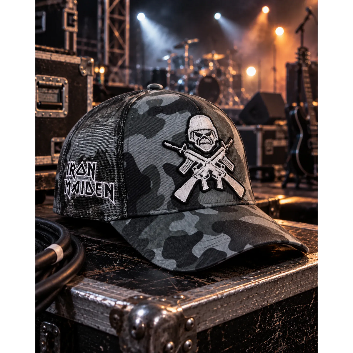 Casquette Iron Maiden camouflage avec motif Eddie brodé A Matter of Life and Death, présentée dans un décor de scène | Iron Maiden camouflage cap with embroidered Eddie design A Matter of Life and Death in a stage setting