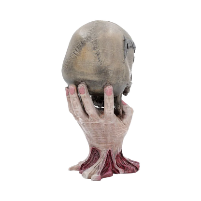 Figurine Metallica Sad But True Skull – vue arrière mettant en valeur la main-support et la base organique