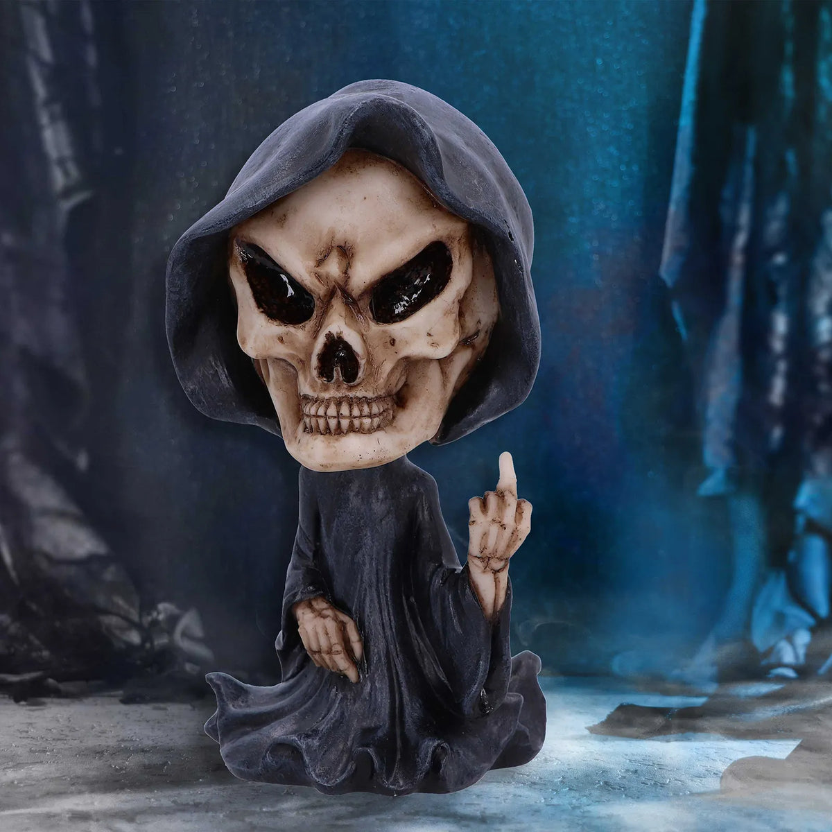 Figurine “Reaper’s Wish” par Nemesis Now sur fond ténébreux – ambiance macabre et humoristique