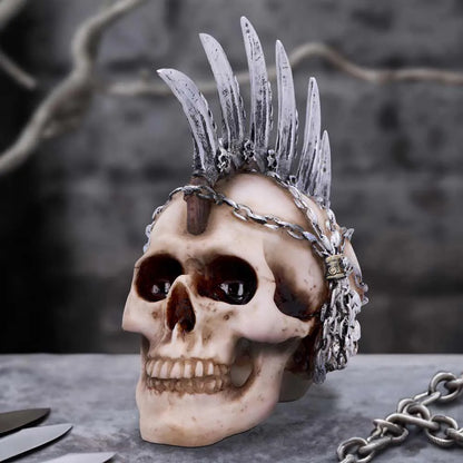 Crâne punk Mohawk Chain Blade vu de face, lames argentées et regard macabre