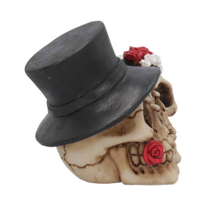 Détail du crâne masculin avec chapeau haut-de-forme et rose rouge entre les dents