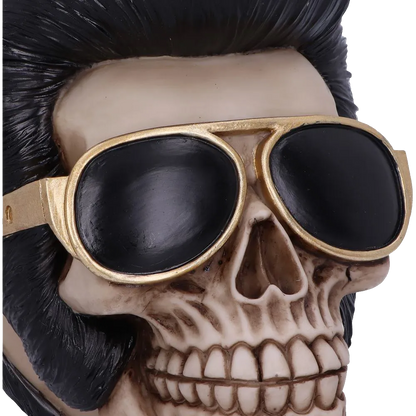 Détail des lunettes dorées sur le crâne