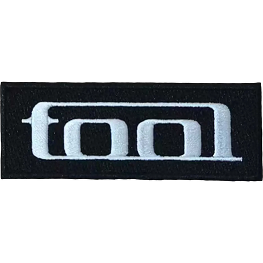 Patch thermocollant officiel Tool logo blanc géométrique sur fond noir 10 × 3,5 cm | Official Tool geometric white logo on black iron-on patch 10 × 3.5 cm