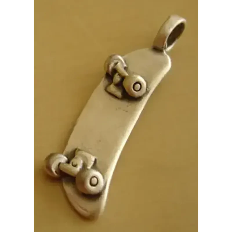 Pendentif [surfeur]