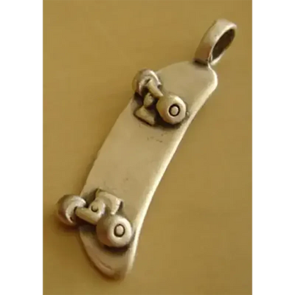 Pendentif [surfeur]