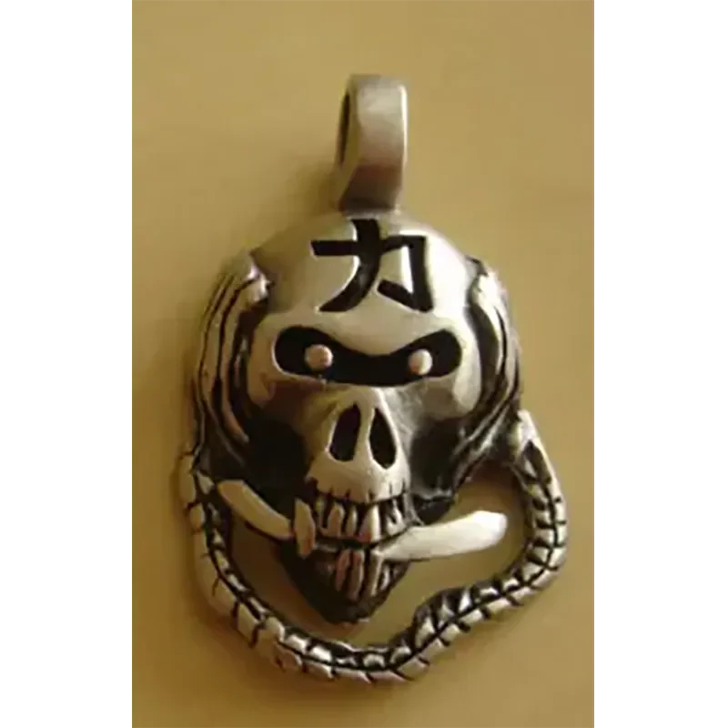 Pendentif [surfeur]