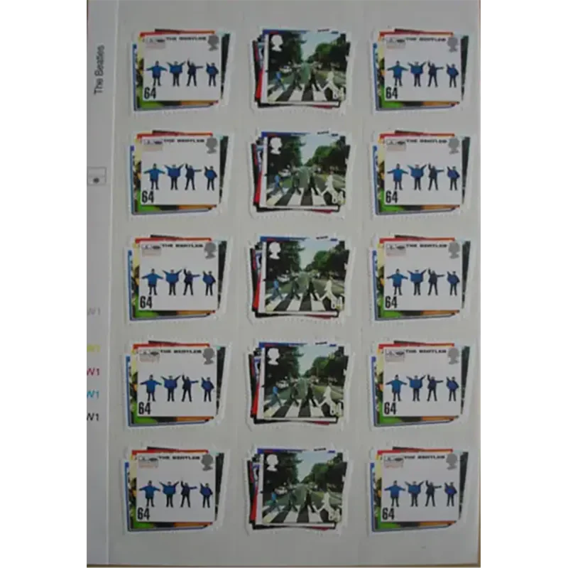 Planche de timbres Beatles officiels – visuels Abbey Road et Help en alternance.