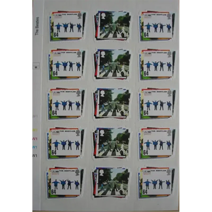 Planche de timbres Beatles officiels – visuels Abbey Road et Help en alternance.