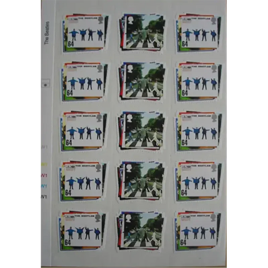Planche de timbres Beatles officiels – visuels Abbey Road et Help en alternance.