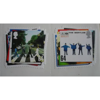 Gros plan sur les timbres Beatles – design Abbey Road et Help.