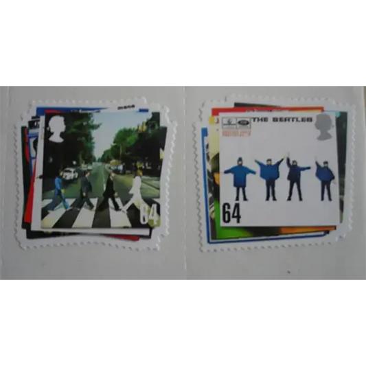 Gros plan sur les timbres Beatles – design Abbey Road et Help.